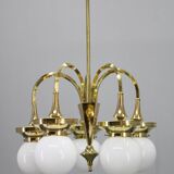 1930s Czechoslovak Art Deco brass chandelier with five opaline glass globes