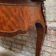 Antique French-style desk with green leather top and bronze mounts