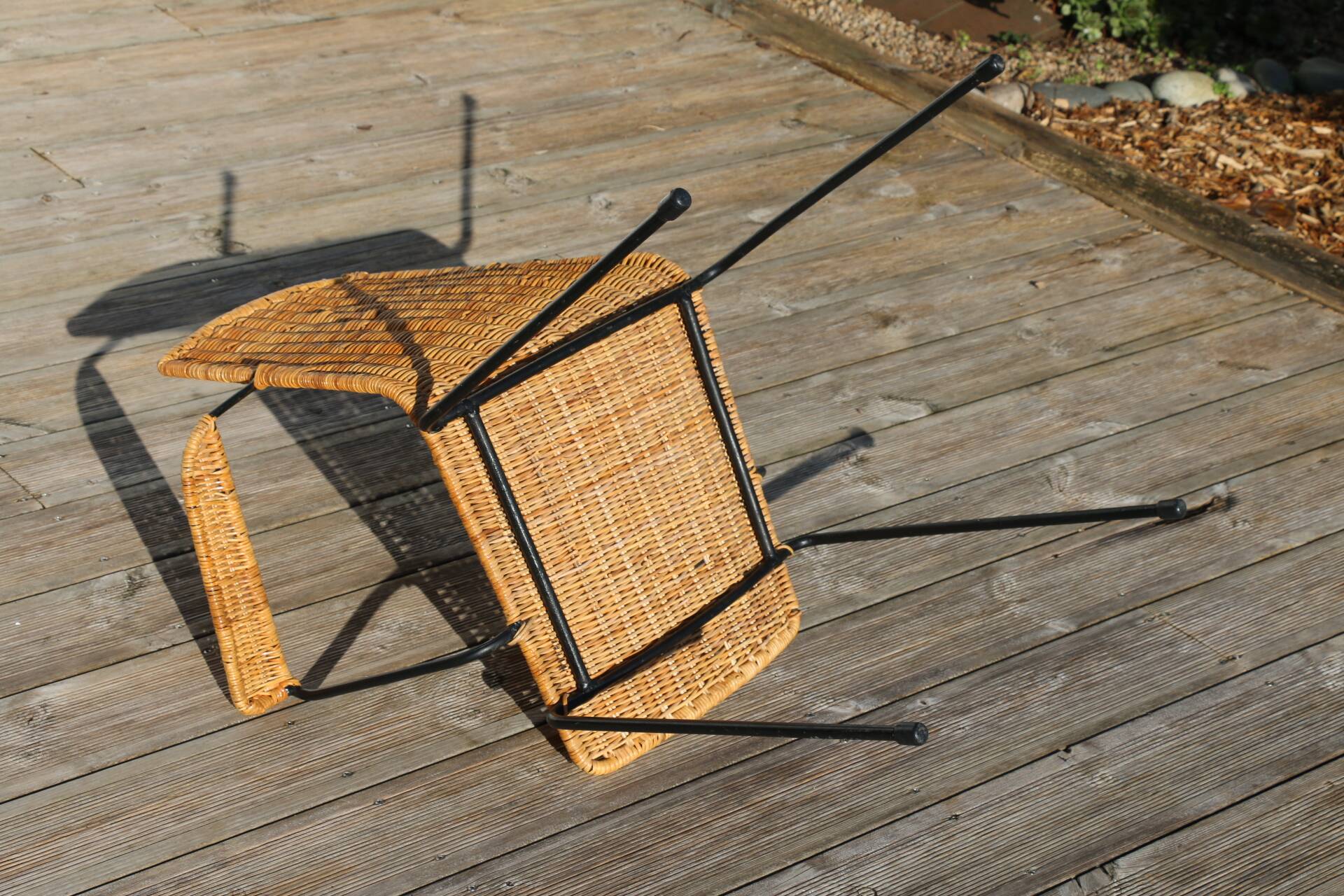 Rattan and steel armchair
