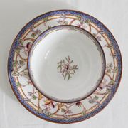 Tasse à café en terre de fer décor Minton mauve Sarreguemines fin XIXe