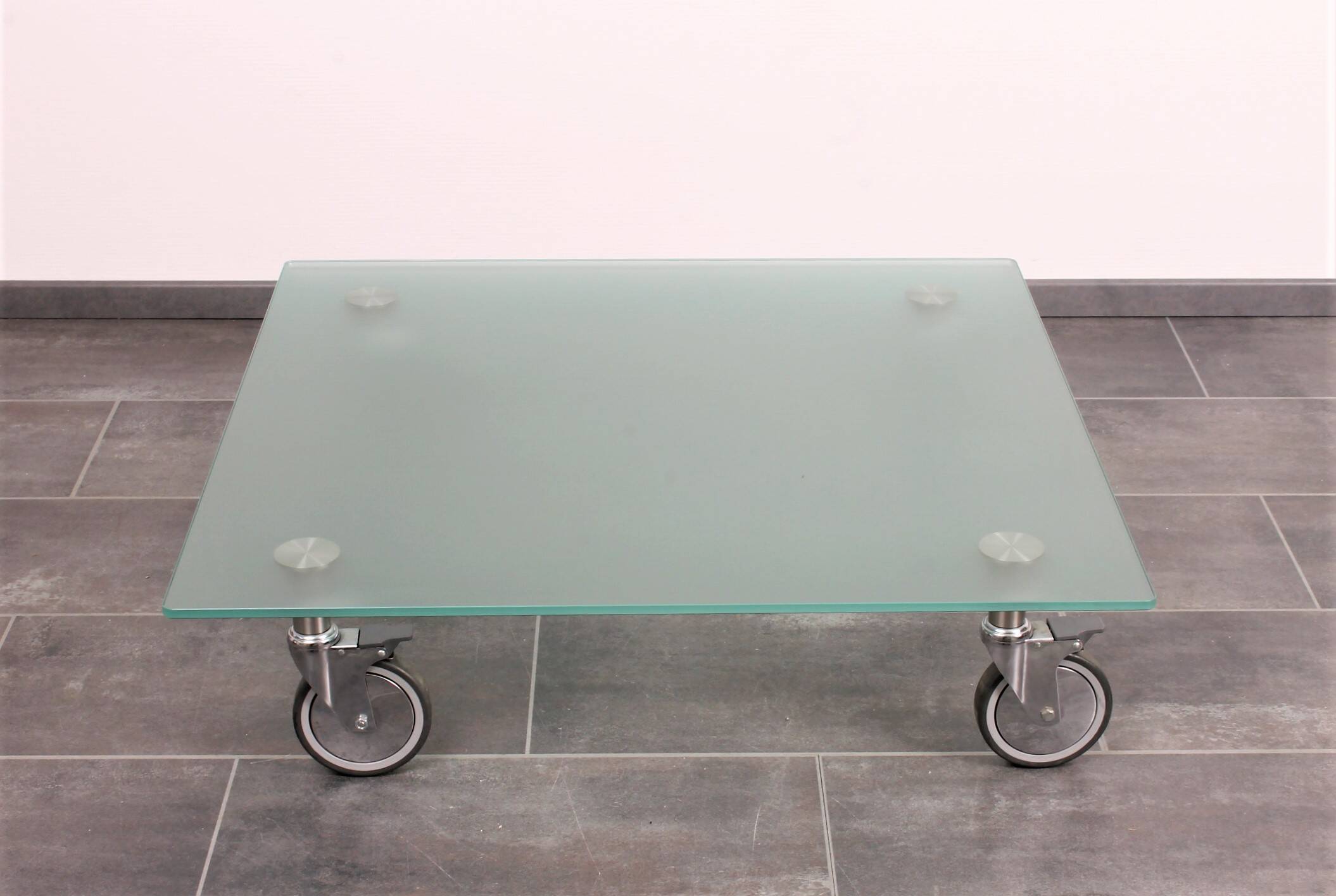 Wheeled glass coffee table