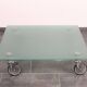 Wheeled glass coffee table