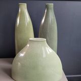 Trio of green enamelled vases