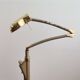 Adjustable swing arm modernist floor lamp