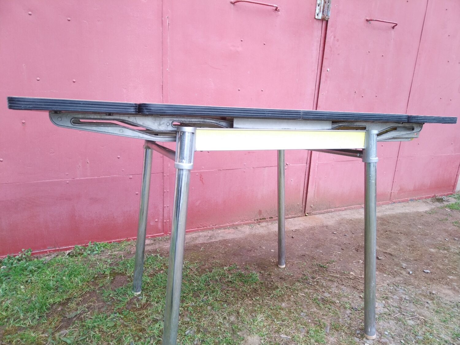 Yellow formica table with extensions