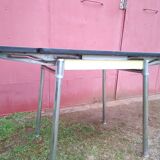 Yellow formica table with extensions