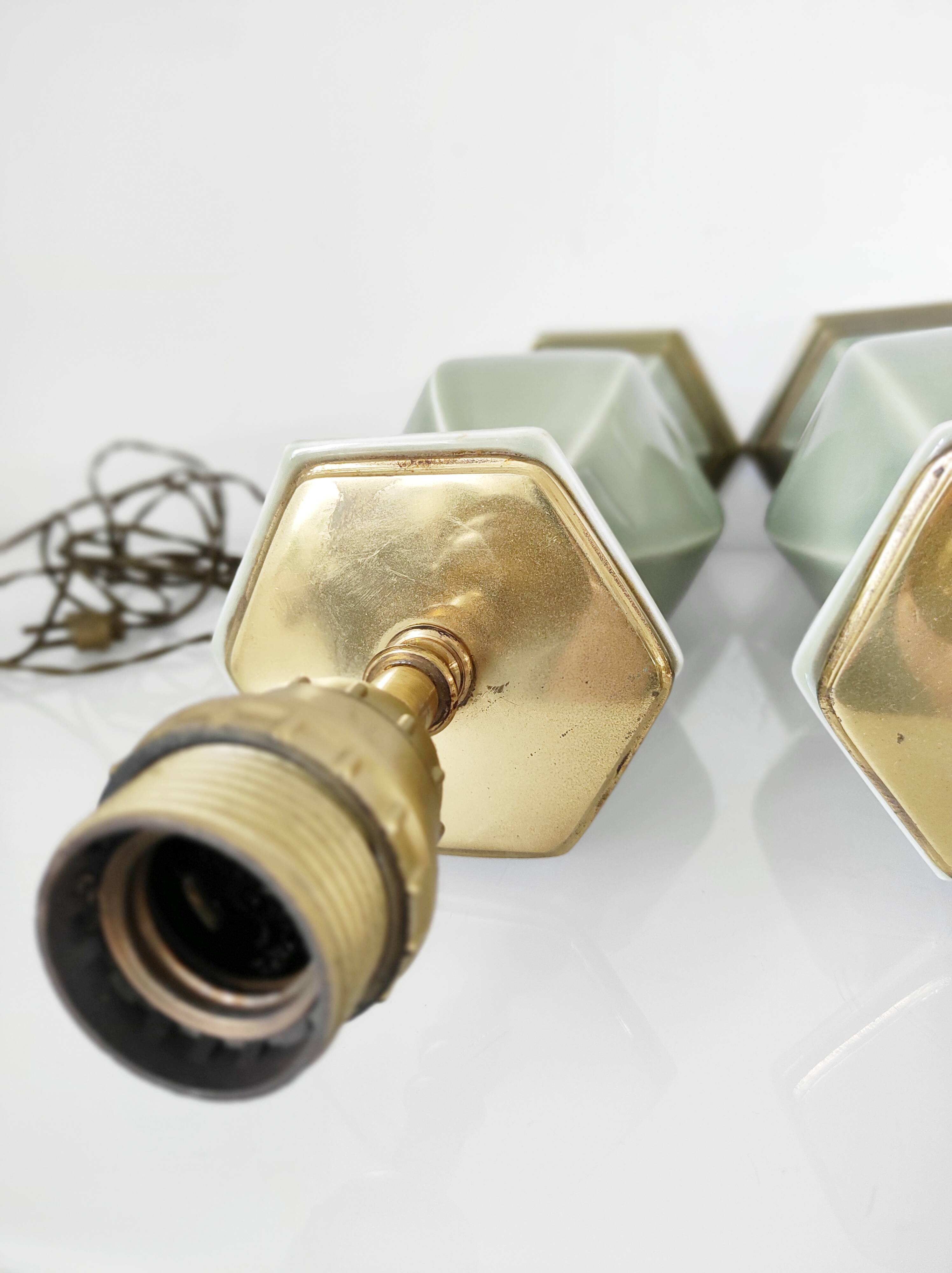 Two celadon-colored ceramic lamp bases