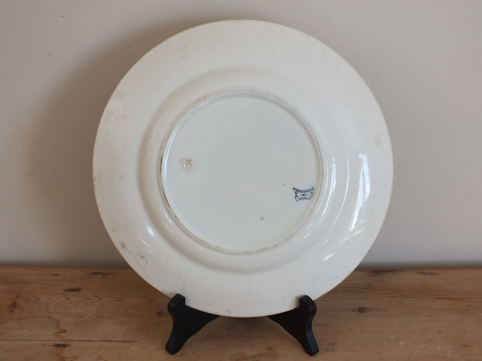 Old round dish in Terre de Fer Lunéville KG Marguerite