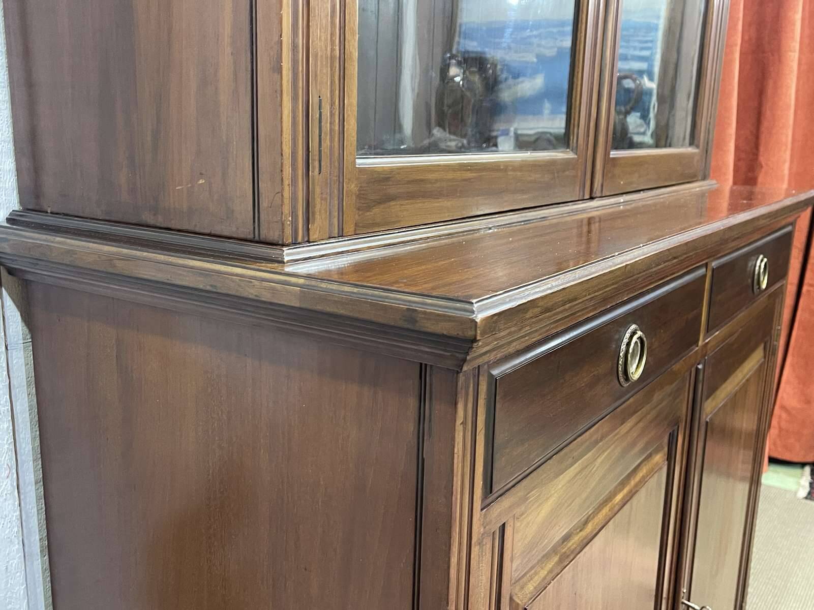 English walnut two-body library from the early 20th century.