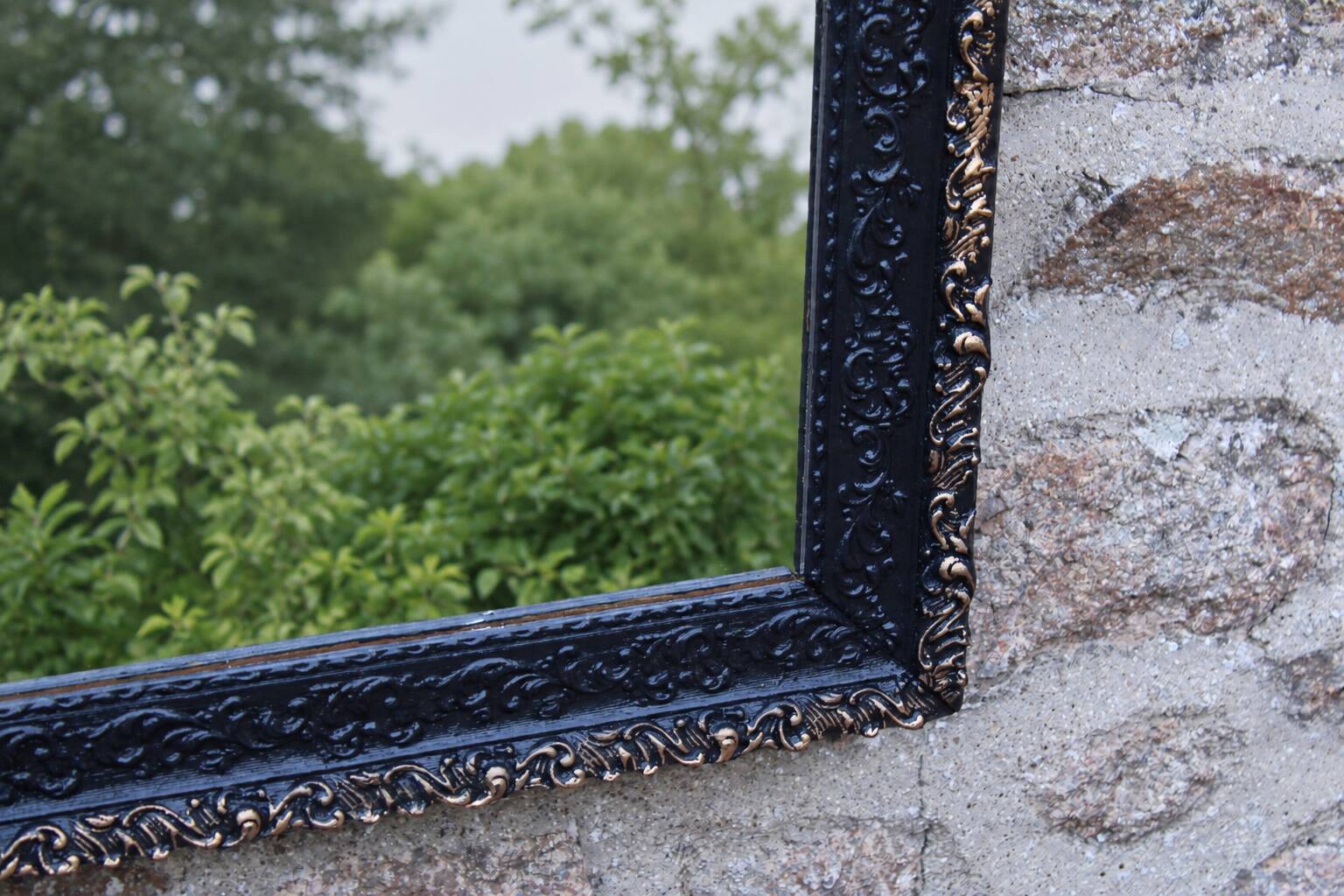 Vintage wooden and stucco mirror in patinated midnight blue with gold – baroque style – 51 ×