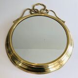 Miroir décoratif oval en laiton orné d'un important noeud torsadé