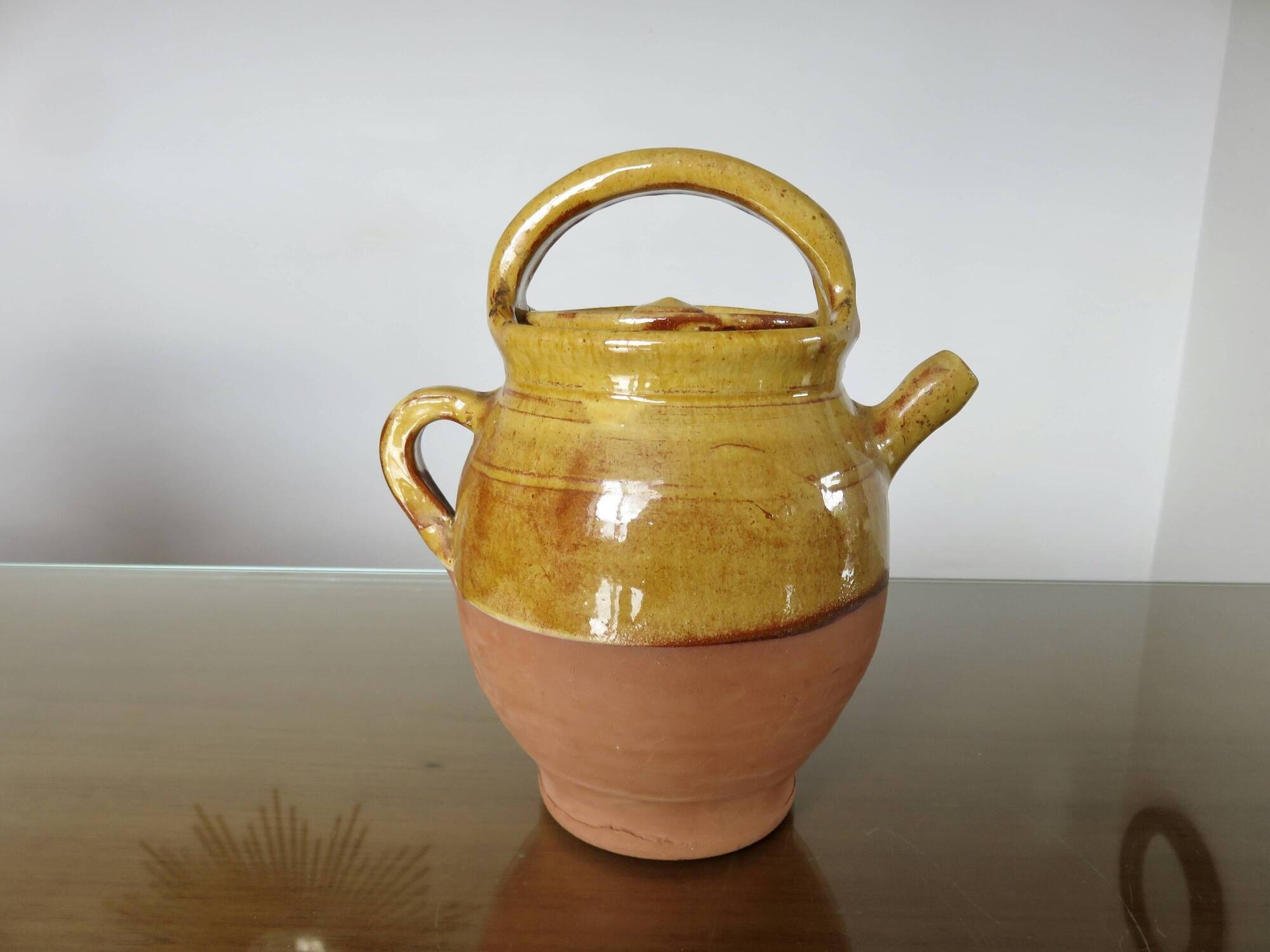 Glazed yellow terracotta jug, south-west of France.