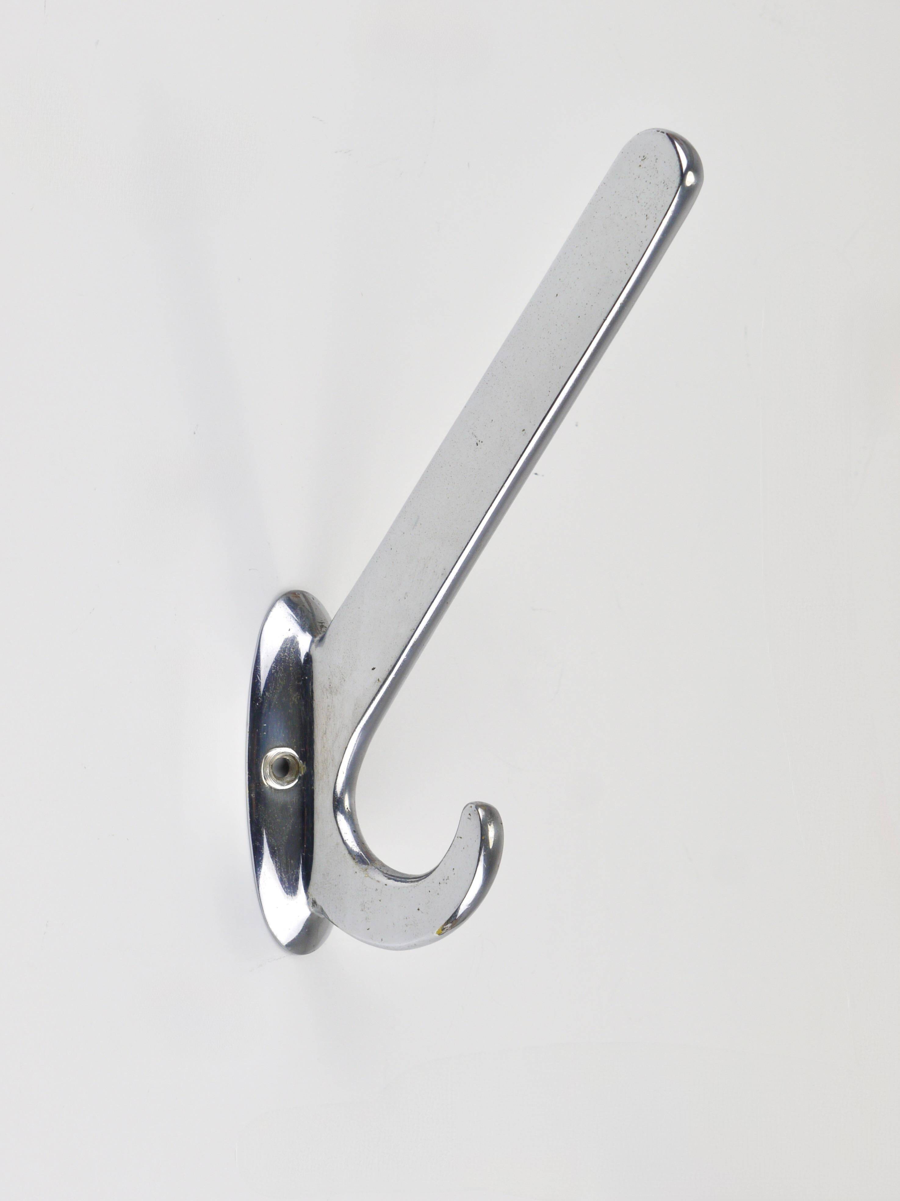Up to 5 large Art Deco Bauhaus wall hooks in nickel and brass, Vienna, 1930s.