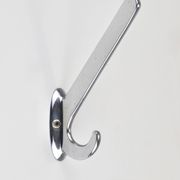 Up to 5 large Art Deco Bauhaus wall hooks in nickel and brass, Vienna, 1930s.