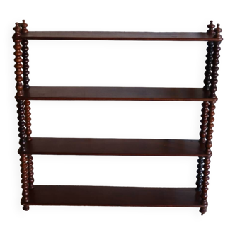Antique mahogany shelf from the Napoleonic period in turned wood
