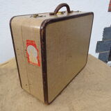1930s Oshkosh suitcase with bakelite hangers