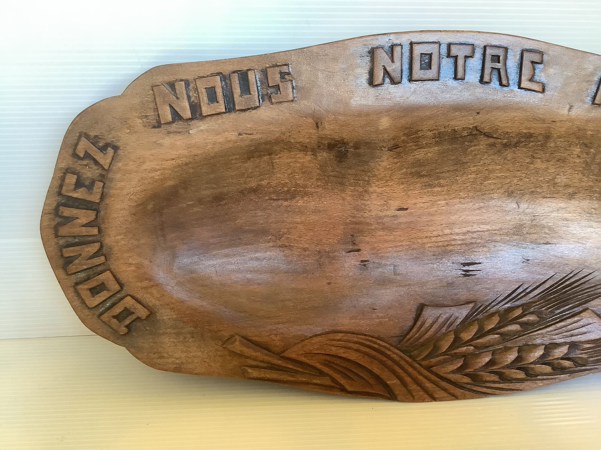 Carved wood dish ears of wheat give us our daily bread