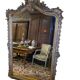 Miroir style Louis XV doré à la feuille d'or du XIXème, 181cm H