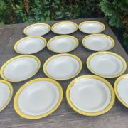 Set of thirteen old porcelain soup plates signed "Biarritz"