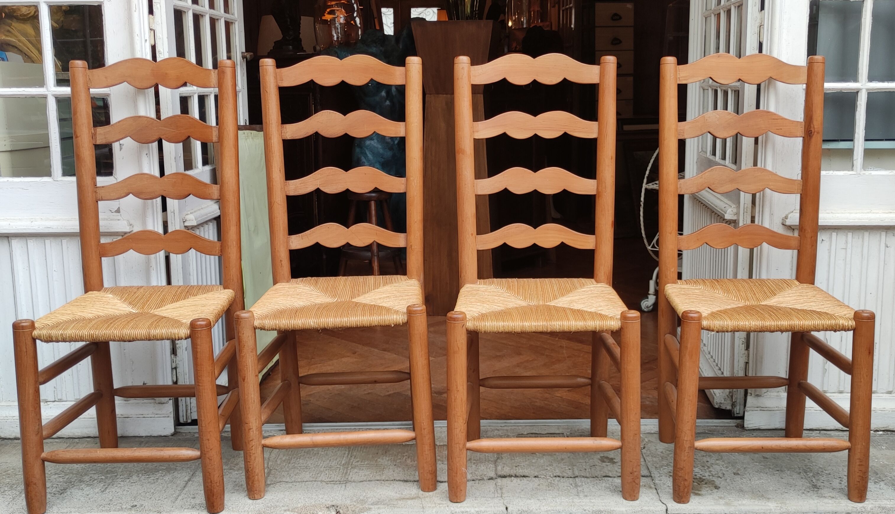 Series of 4 antique mulched chairs