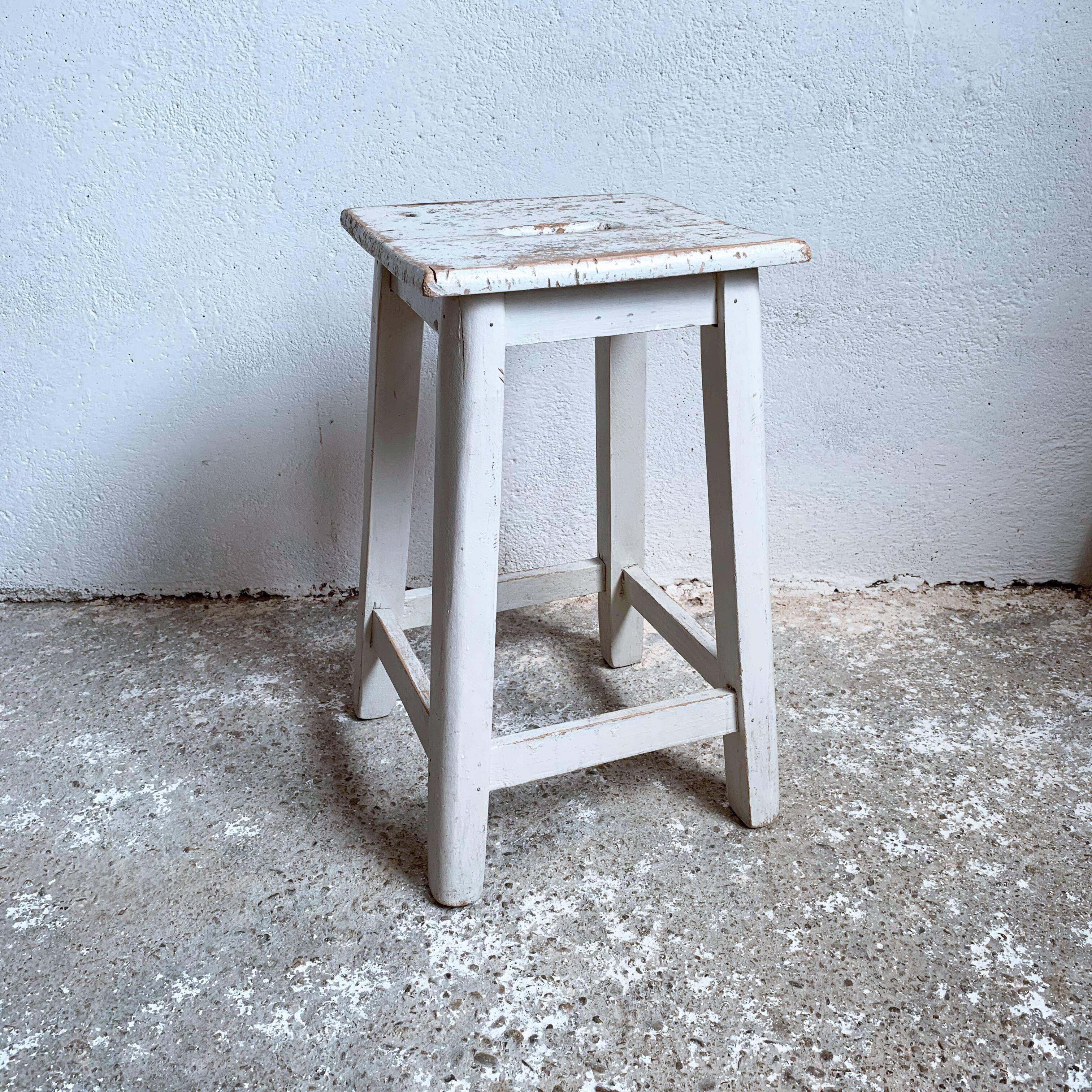 White wooden workshop stool