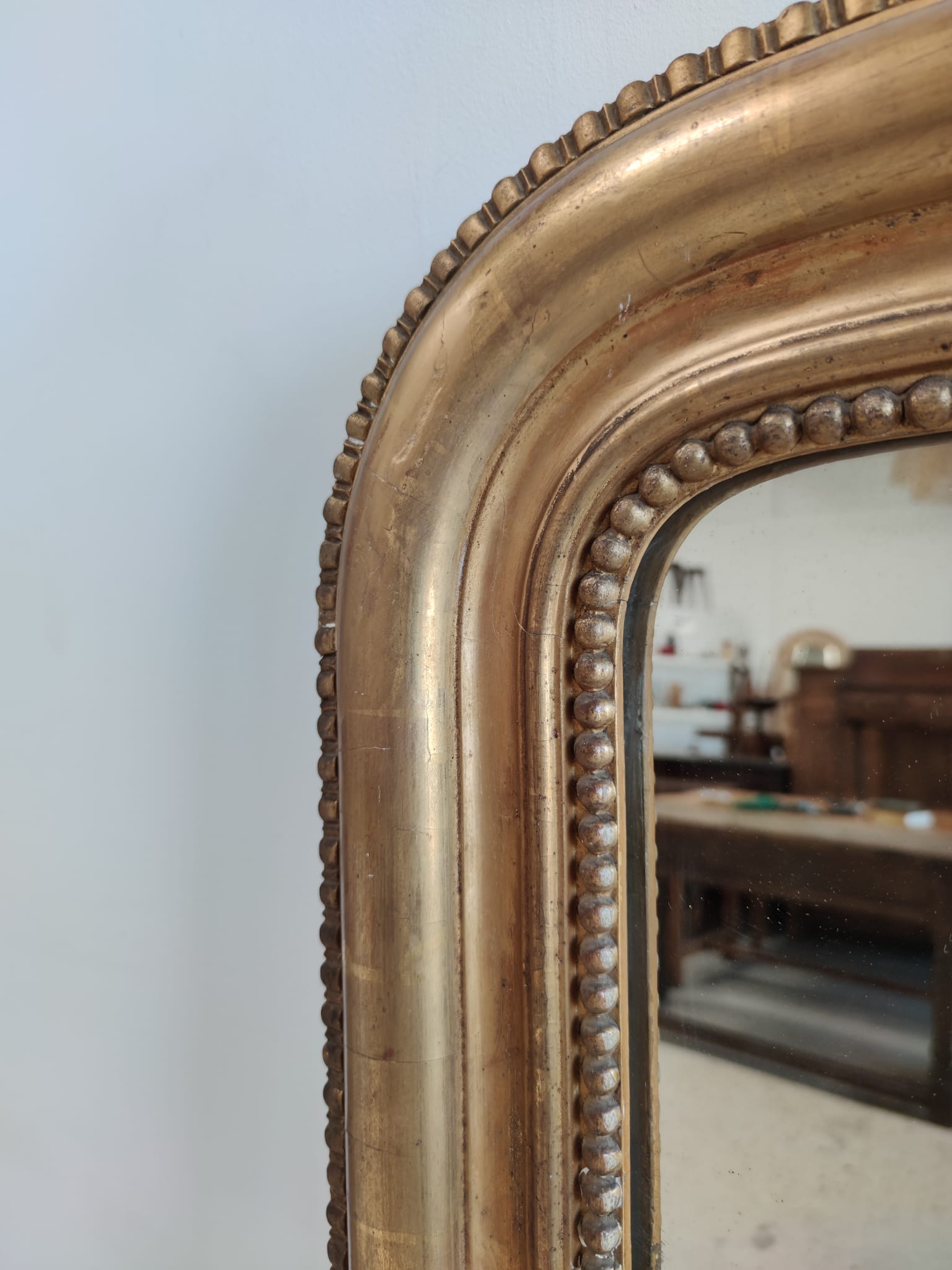Louis Philippe gilded mirror with gendarme hat nineteenth H:130cm