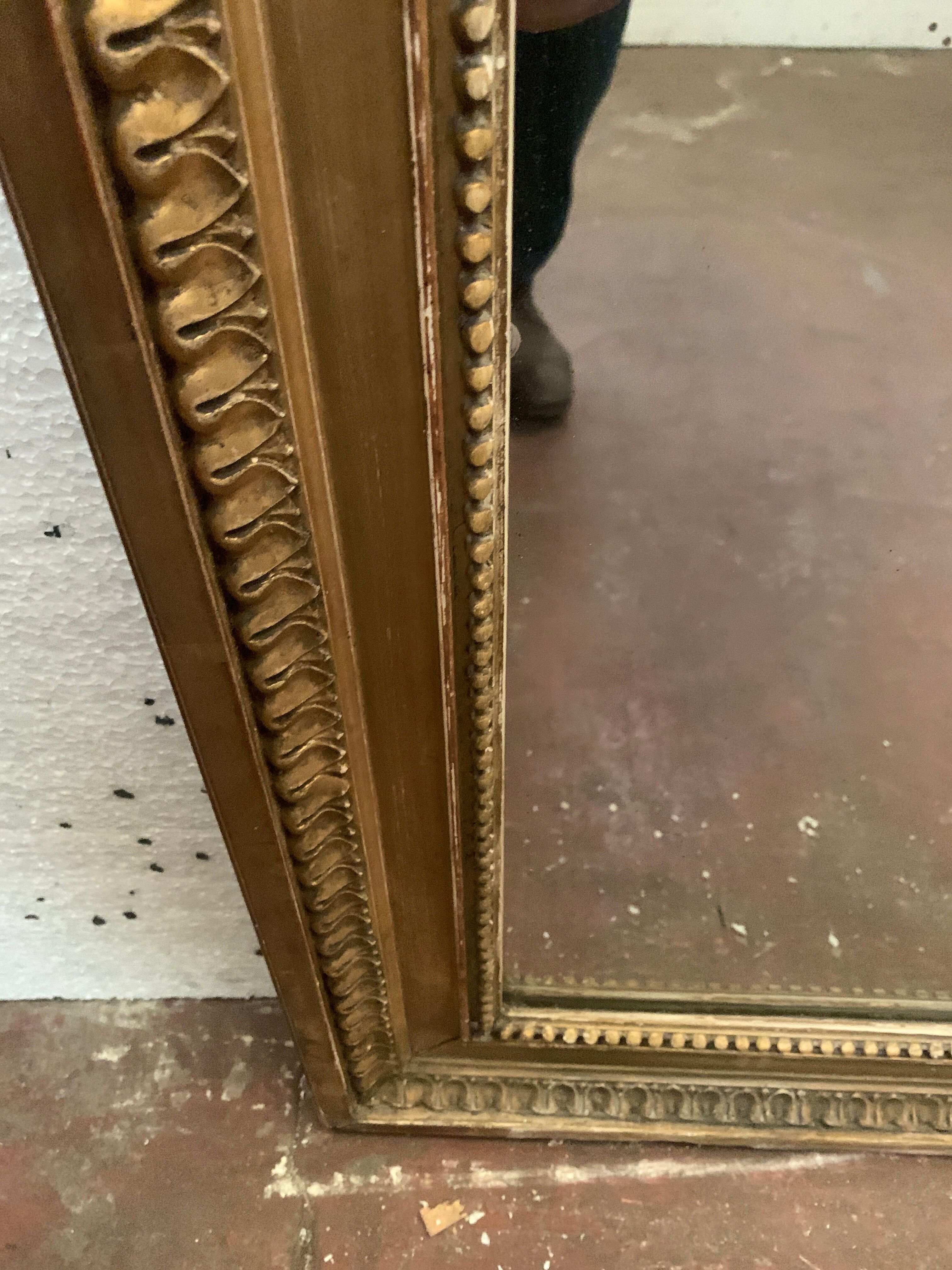 Louis XVI style mirror in wood and gilded stucco XIX century