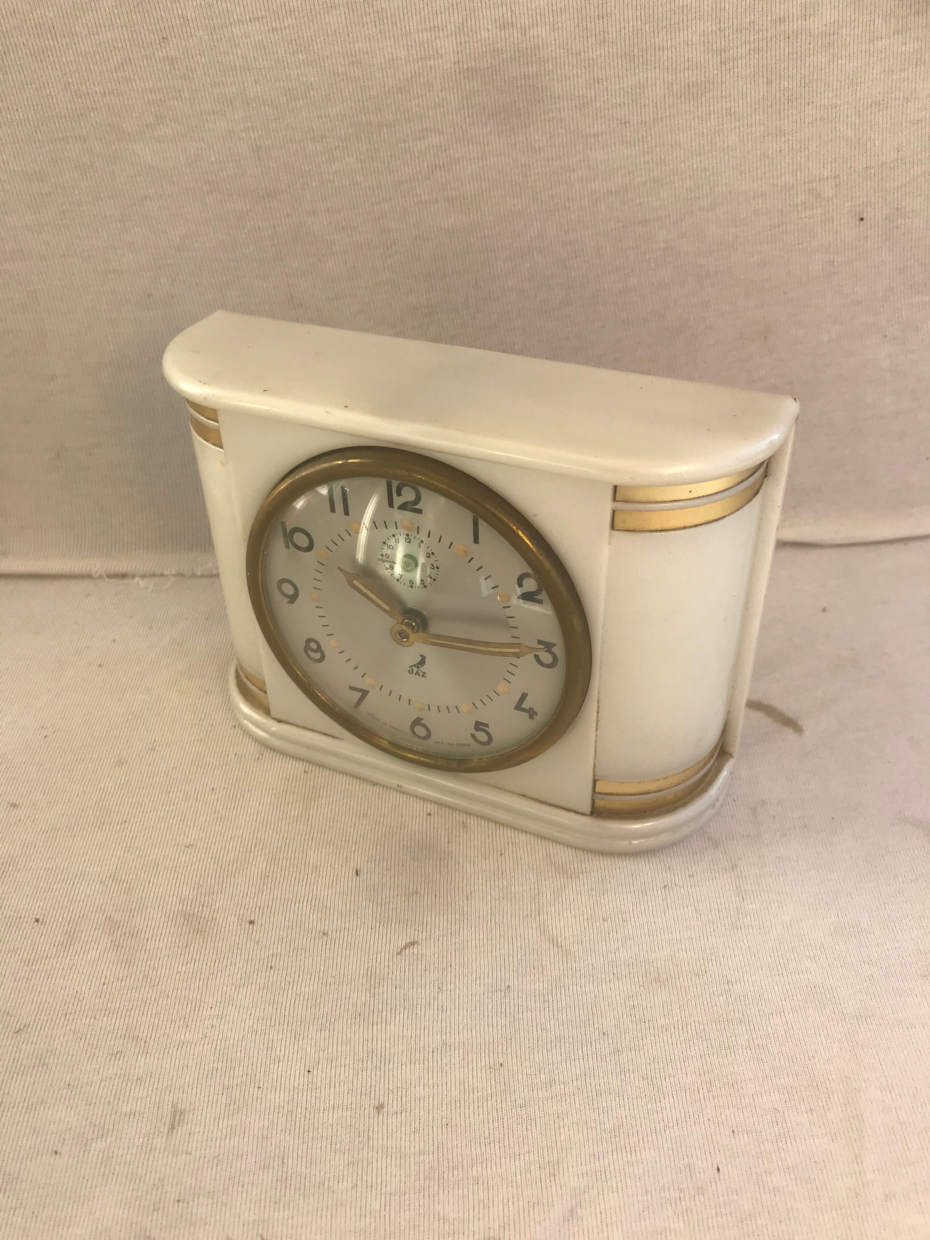 Ancien réveil jaz bakélite blanc