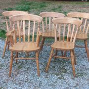 Set of 4 chairs and 1 armchair in mountain style made of oak.