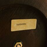 1980s ceramic table lamp with a wooden base and adjustable shade.