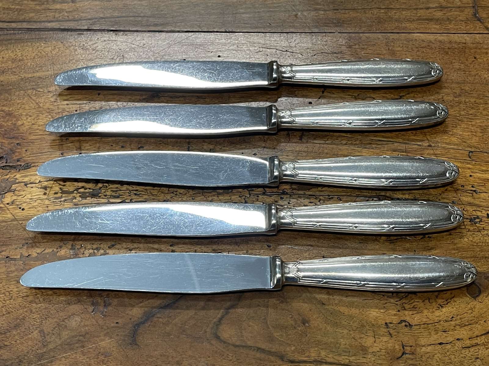 Series of 5 large Christofle knives model Ribbons