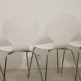 Set of 4 living room chairs in curved wood veneer and chrome base from the 70s.