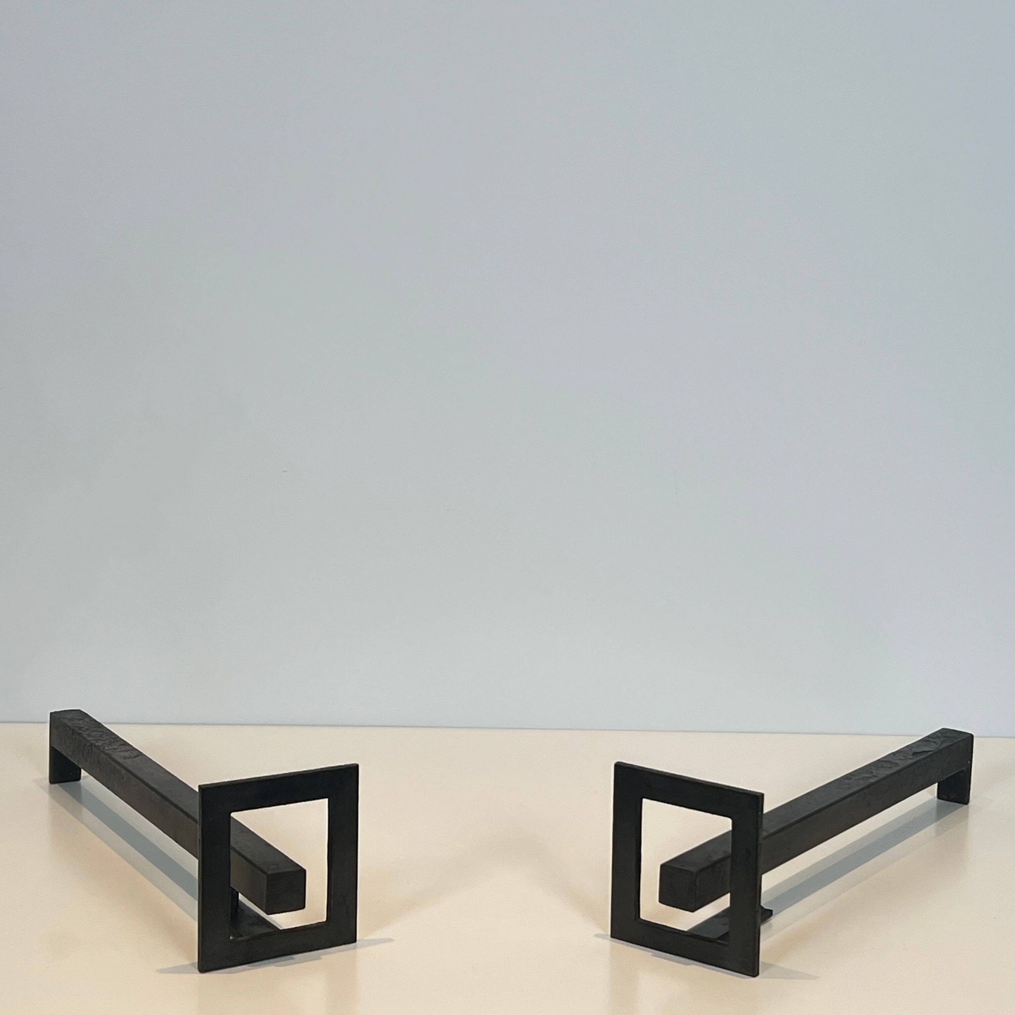 Paire de chenets modernistes en acier et fer forgé