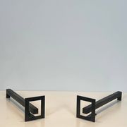 Paire de chenets modernistes en acier et fer forgé