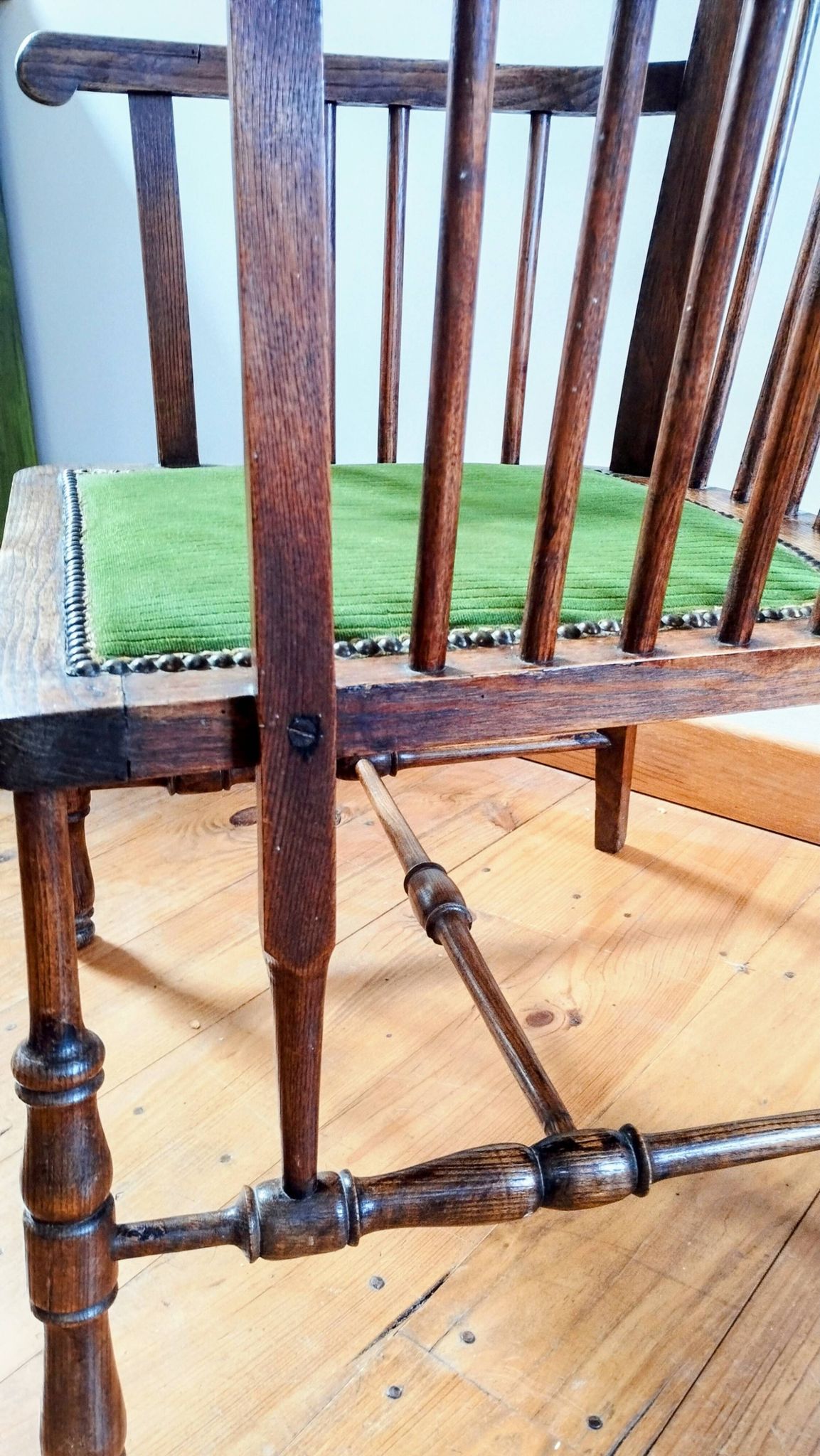 1900s Arts and Crafts style tapered wingback armchair