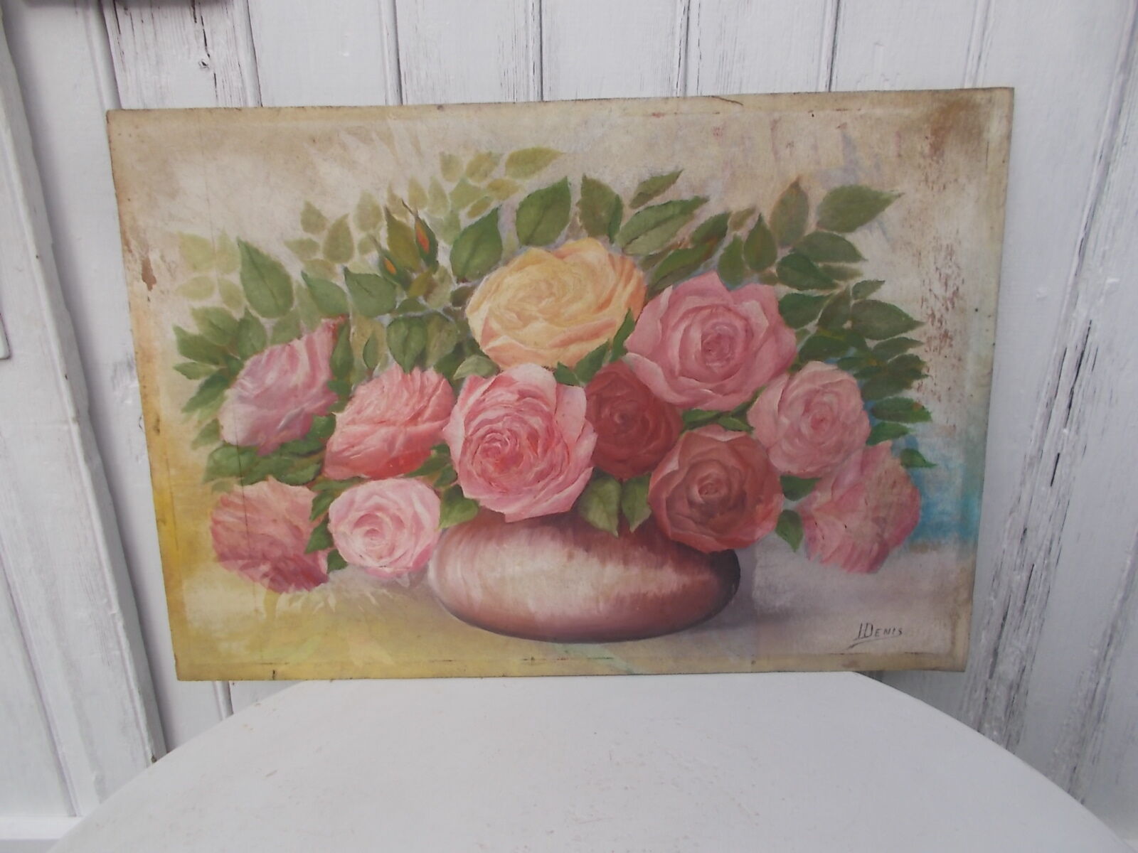 Tableau of a bouquet of flowers on a double-sided wooden panel.