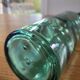 Vintage glass bottle l'Idéale with porcelain stopper