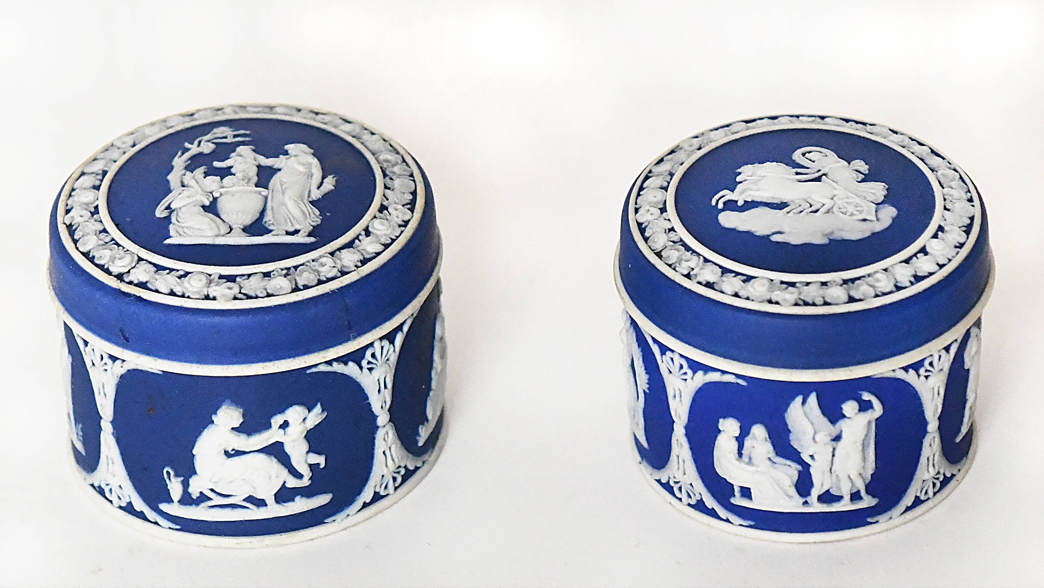 Pair of Wedgwood biscuit boxes with relief decoration of antique scenes