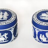 Pair of Wedgwood biscuit boxes with relief decoration of antique scenes