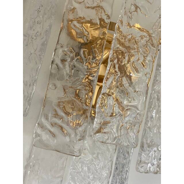 Pair of contemporary hammered strips ”listelli” murano glass wall sconces