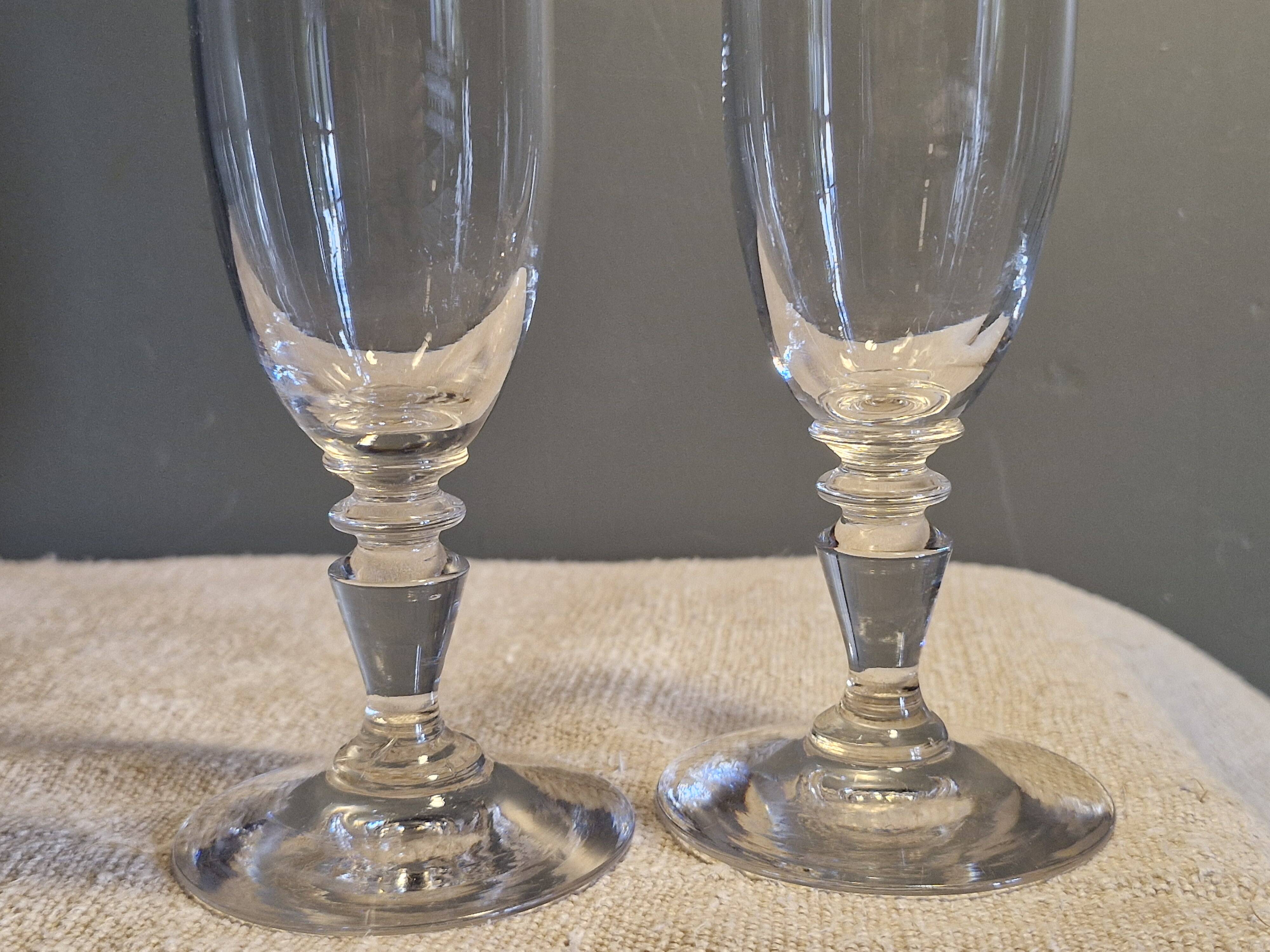 2 antique crystal champagne flutes