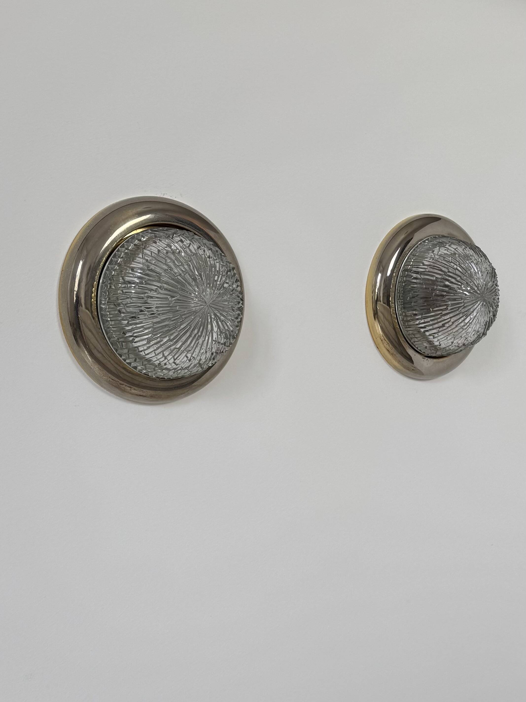 Pair of vintage wall lights, brass and pressed moulded glass, France, 1960.