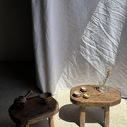 Small stool, oval solid teak accent stool with a two-tone seat.