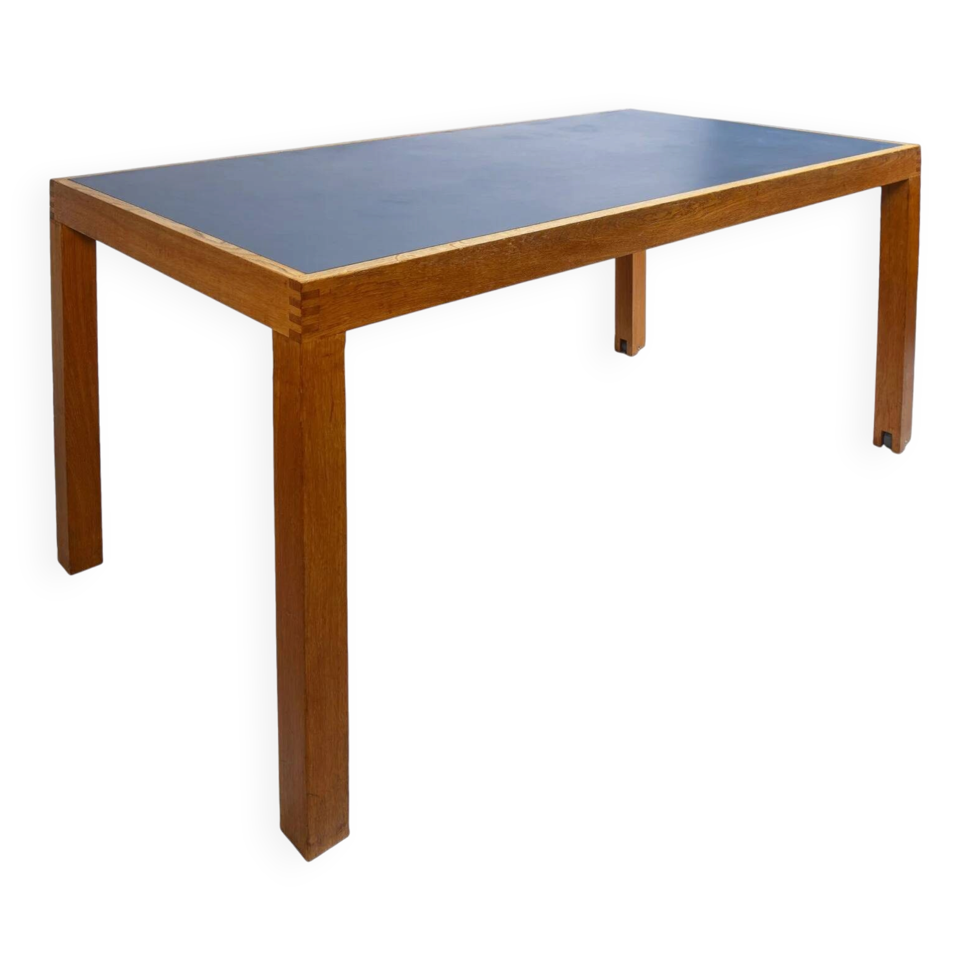 Pine table with a top covered in linoleum.