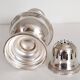 Silver-plated sugar shaker with fluted edges
