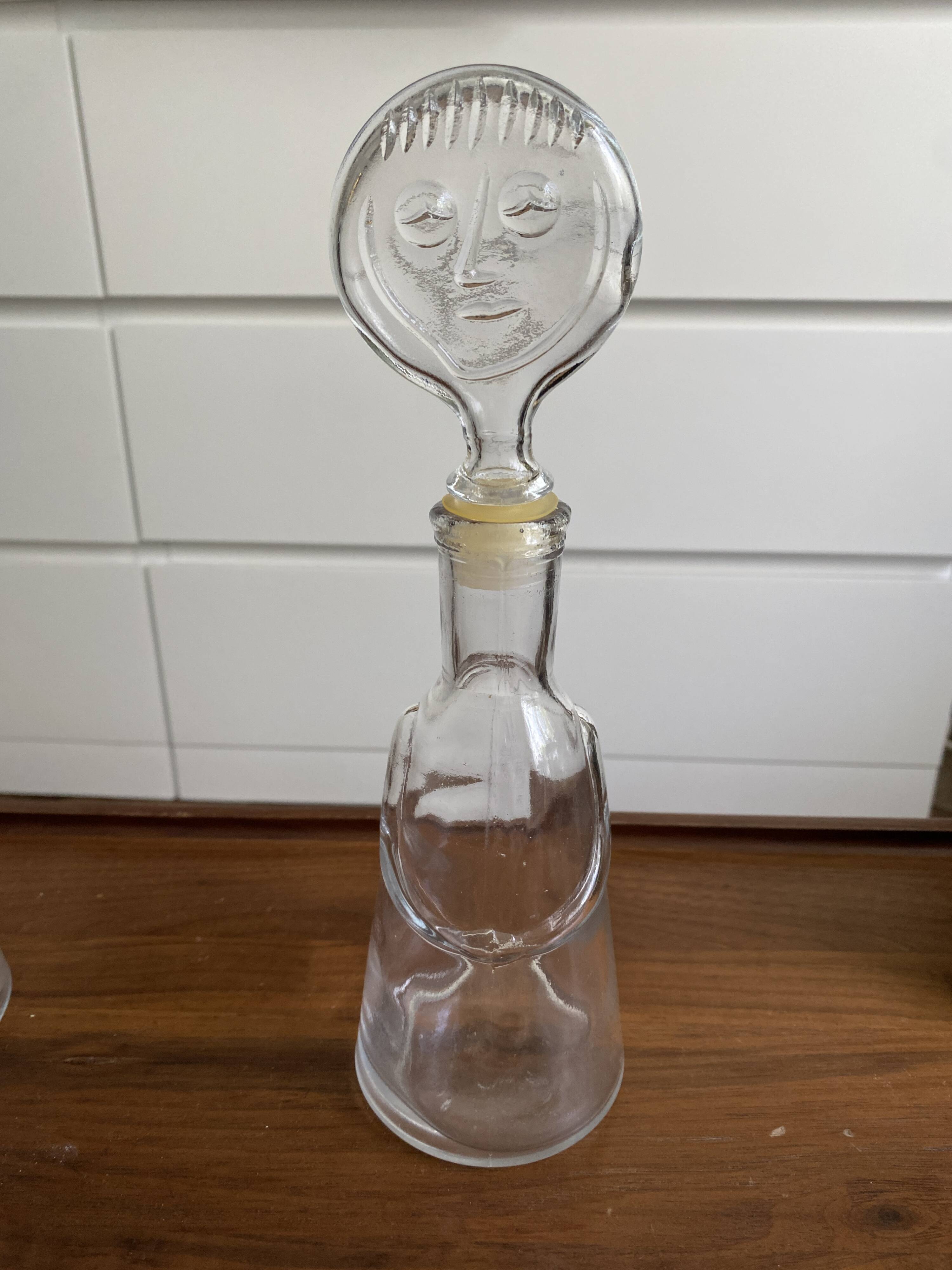 Pair of decanters by Erik Hoglund for Neiman Marcus, "People" series, Kosta Boda