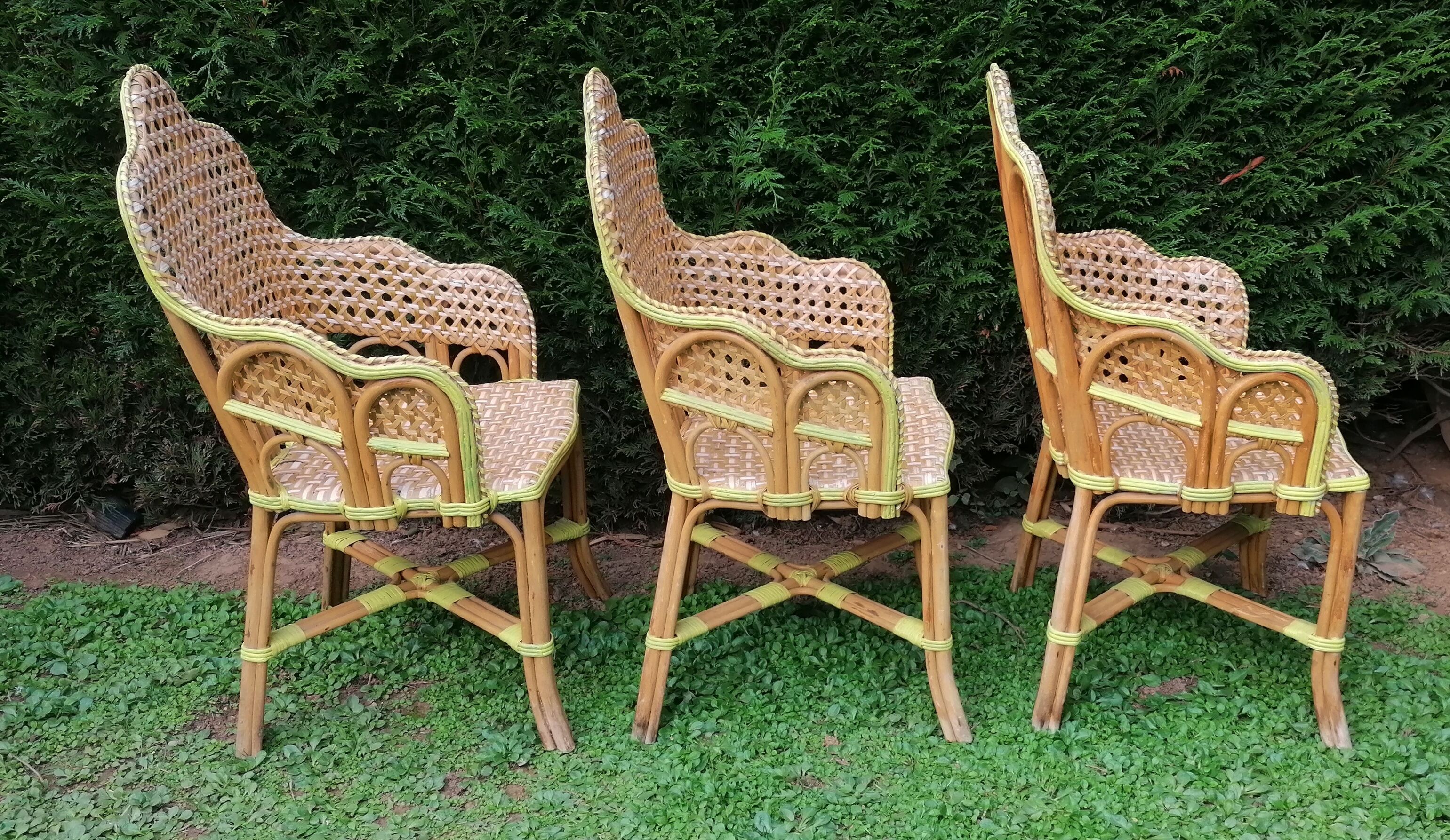 3 woven rattan armchairs