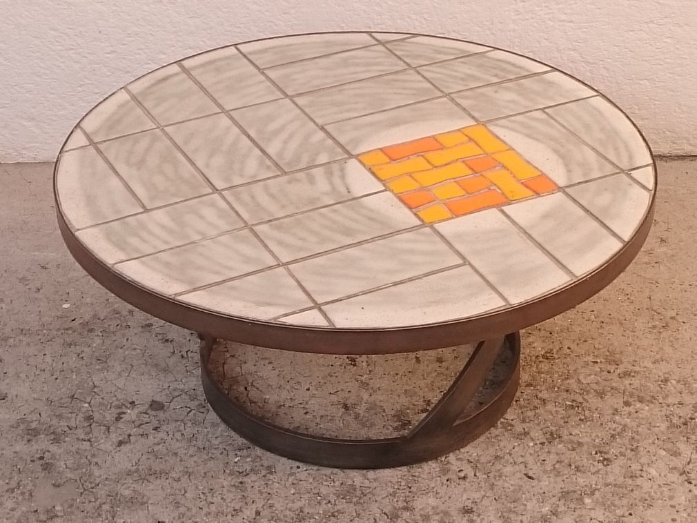 Round ceramic and steel coffee table