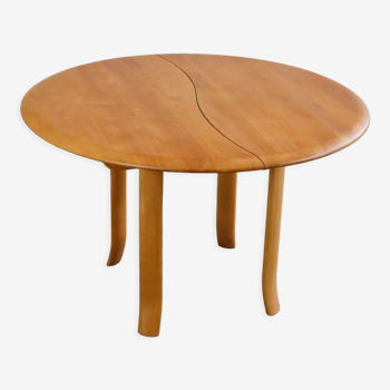 round vintage table with wiggle legs