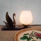 Art Deco swan and white globe table lamp with black marble base